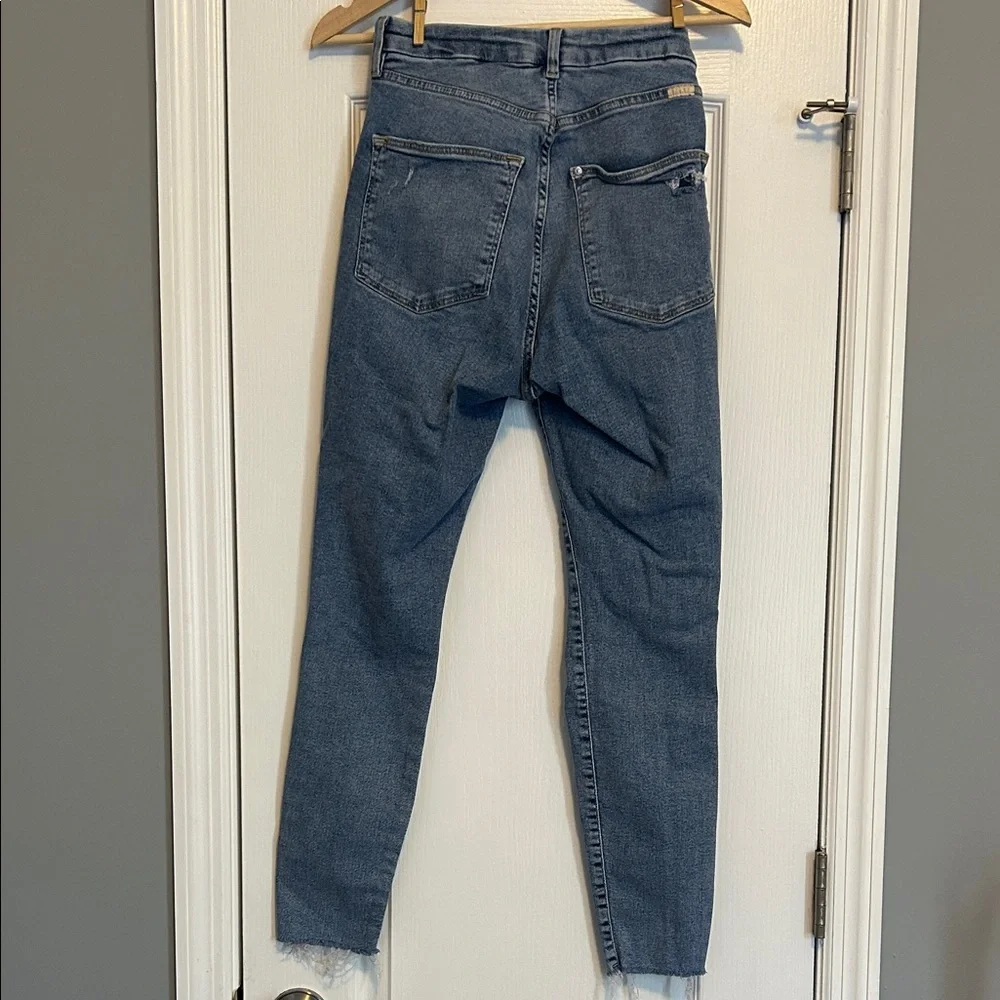 Classic Distressed Skinny Jeans in Blue size 4